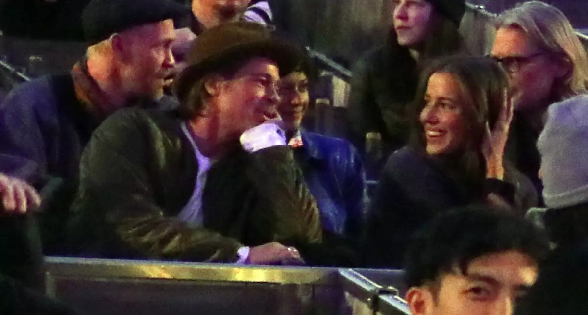 PREMIUM EXC Brad Pitt and Nicole Poturalski