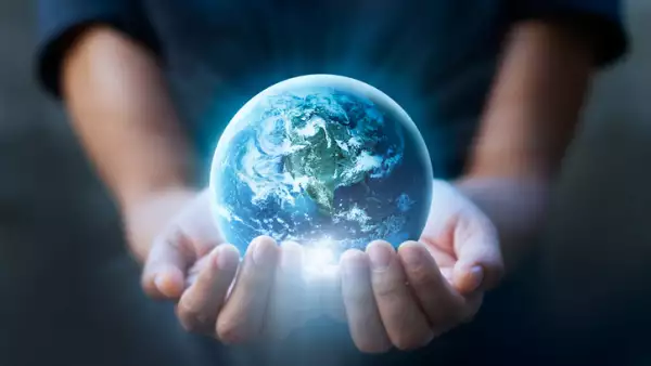 Earth day, Human hands holding blue earth, save earth concept. Elements of this image furnished by NASA