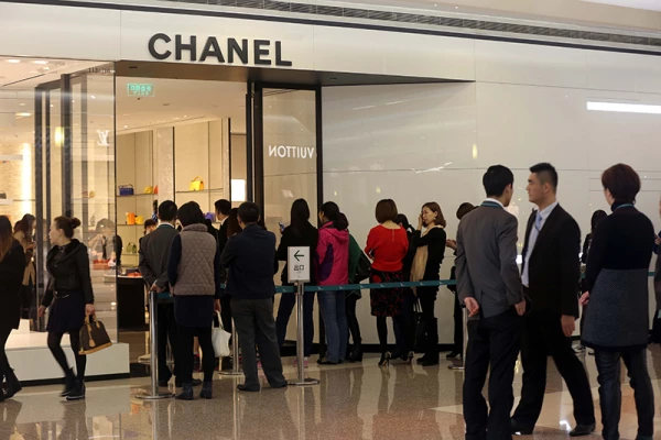 Long lines form at stores after Chanel cuts prices, Shanghai, China - 19 Mar 2015