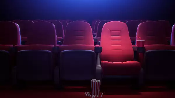 Row of empty red cinema seats