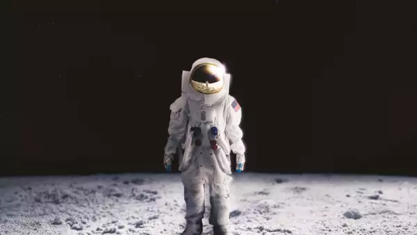 Astronaut standing on the moon surface