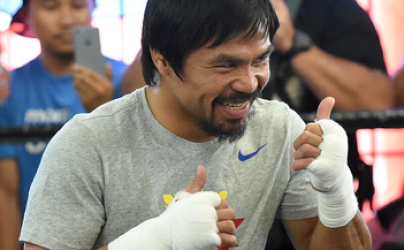 La pelea entre Pacquiao y Mayweather está valuada en 300 mdd. (Foto: Getty Images )