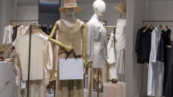 Women choose clothes in clothing stores