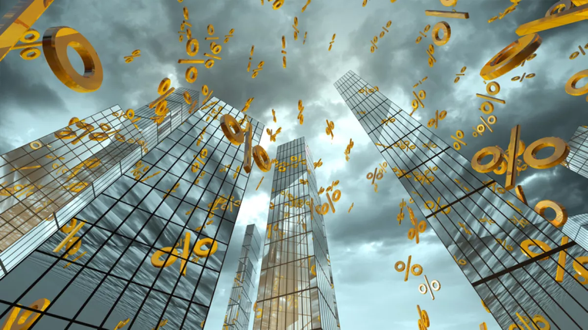 simbolos de pporcentaje cayendo sobre edificios