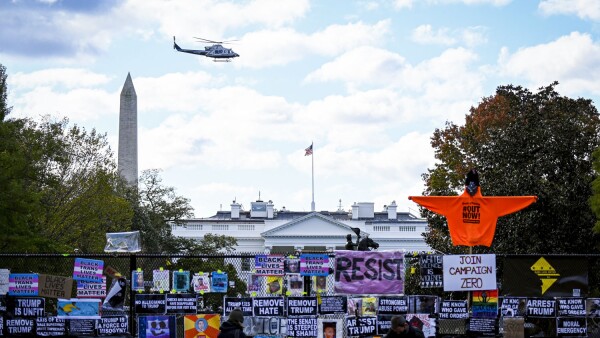 Helicopter passes over the White House the day before the U.S. presidential election in Washington