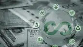 Símbolo de infinito con iconos de ESG sobre billetes de dólares.
