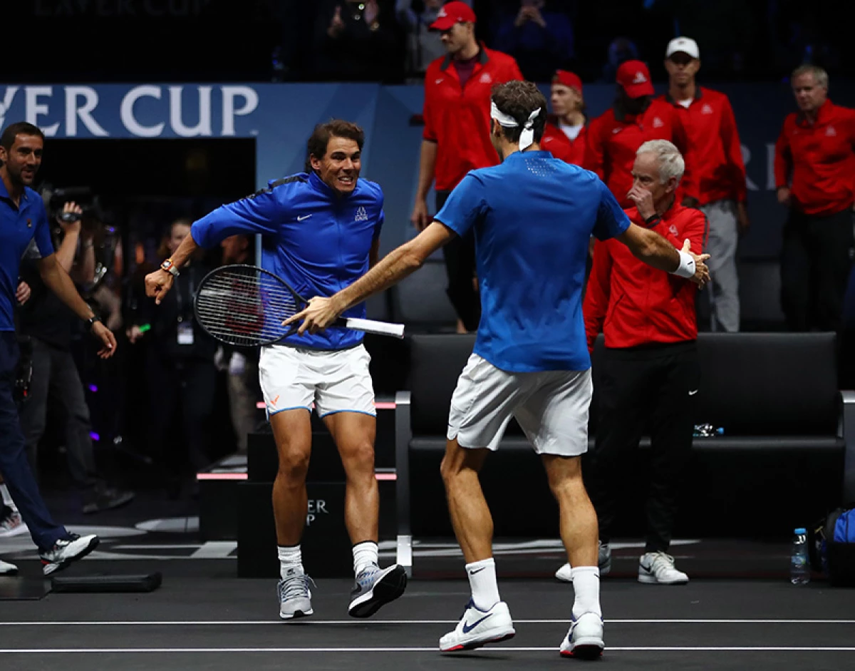 rafael nadal y roger federer festejan