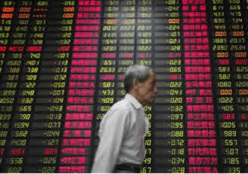 Los mercados tuvieron tranquilidad tras un reporte que mostró una contracción menor a la esperada en la economía estadounidense entre abril y junio. (Foto: AP)
