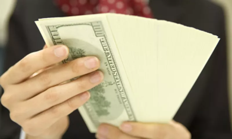 Banco Base estima que este martes, el tipo de cambio varíe entre 12.62 y 12.69 pesos por dólar. (Foto: Getty Images)