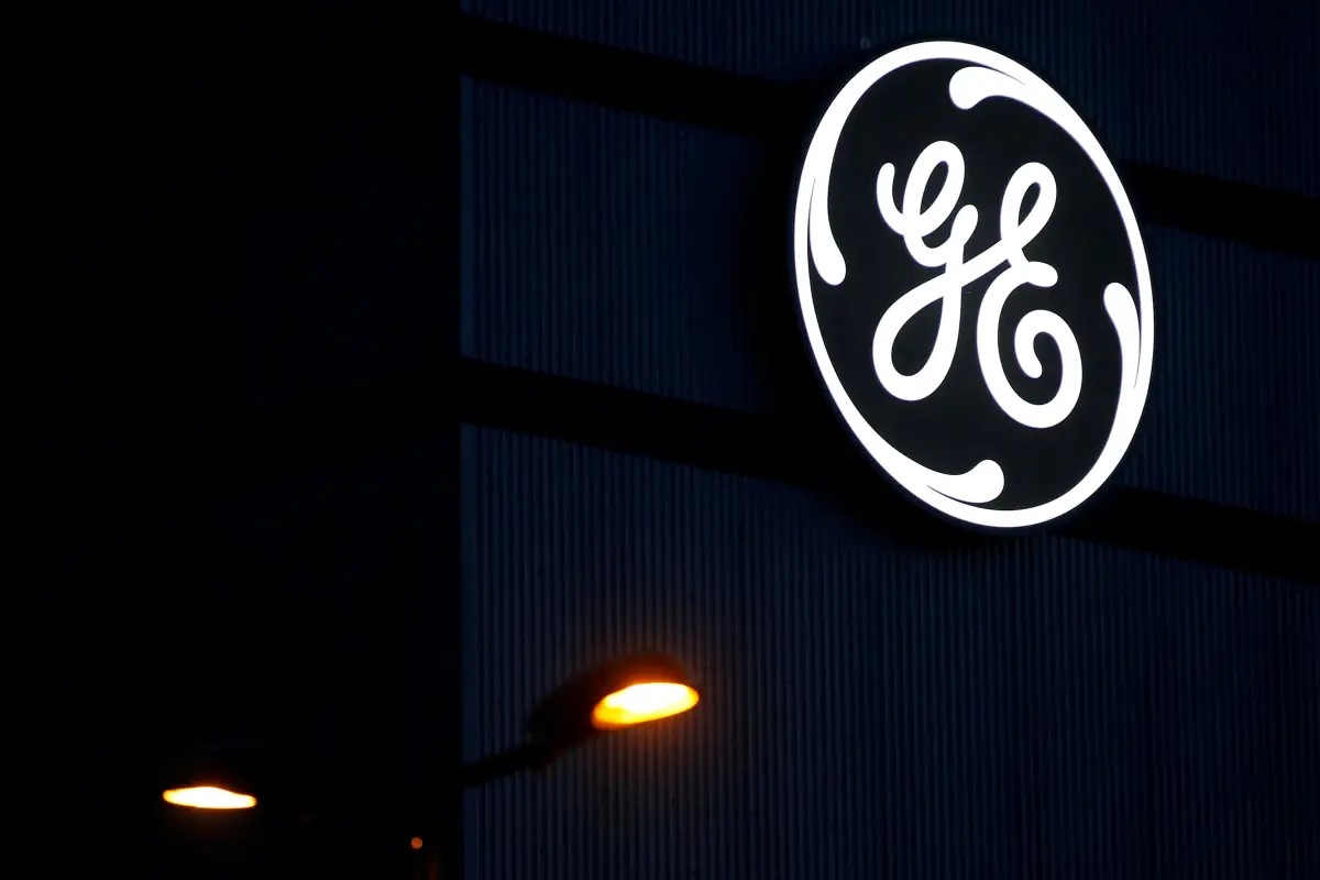 FILE PHOTO: The General Electric logo is pictured on the General Electric offshore wind turbine plant in Montoir-de-Bretagne