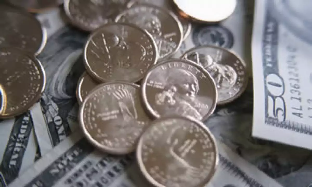 En ventanillas de bancos y casas de cambio, el peso operaba en 11.48 por dólar a la compra y en 11.88 pesos a la venta. (Foto: Photos to go)