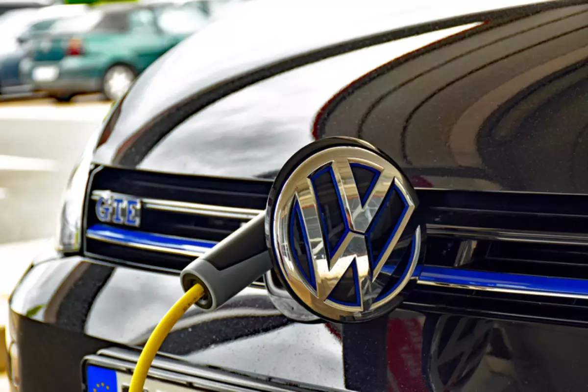 Volkswagen Golf GTE is charged at a charging station