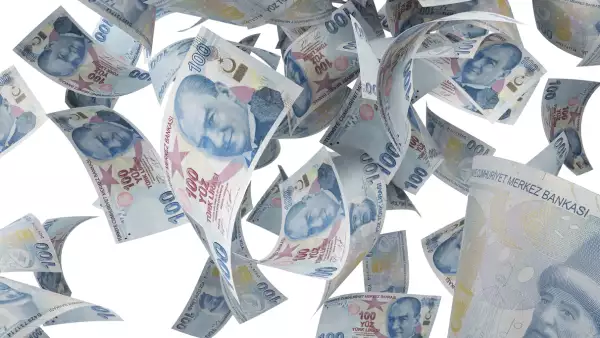 One Hundred Turkish Lira Banknotes Falling On White Background