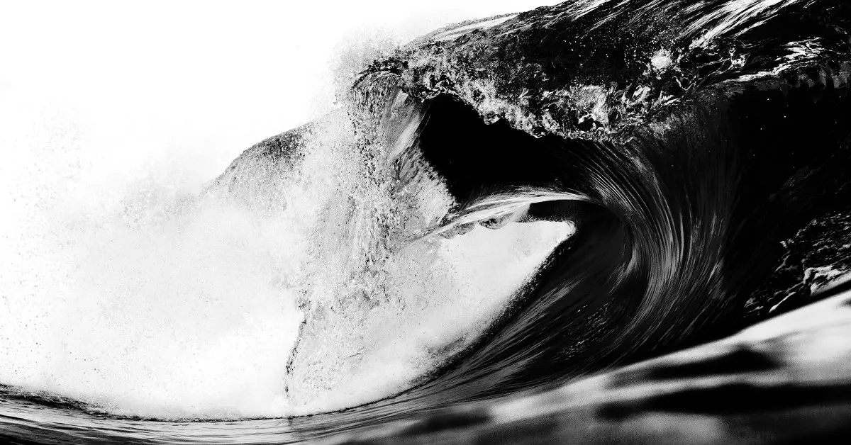 Ilustración en blanco y negro de una ola de mar.