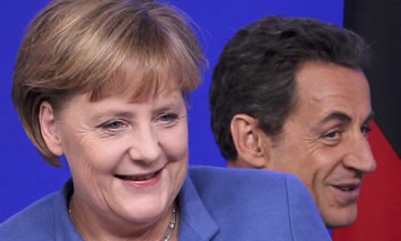 Las risas de Angela Merkel y Nicolas Sarkozy también se extendieron por la sala de prensa apenas se mencionó el nombre del jefe de Gobierno italiano. (Foto: Reuters)