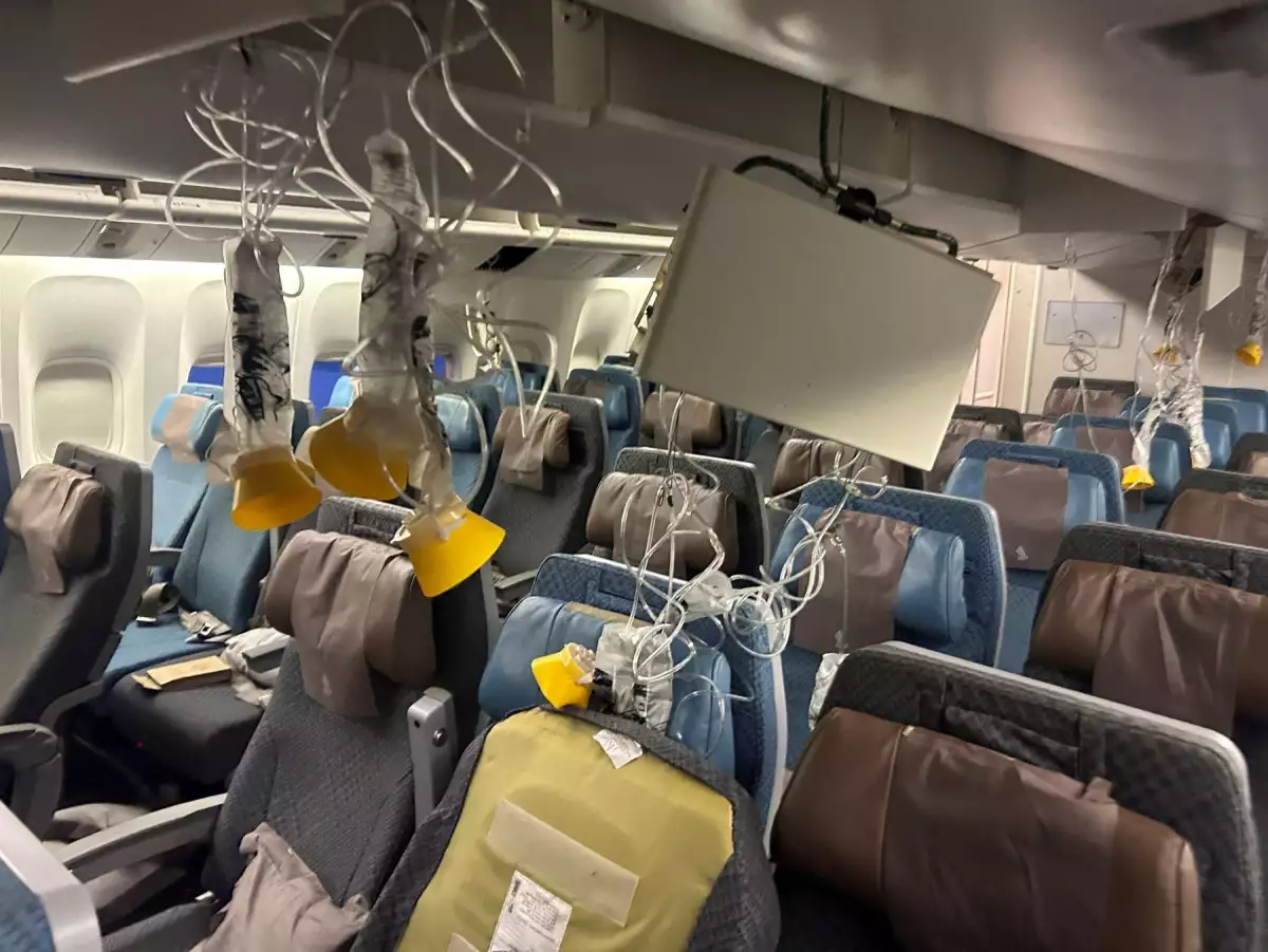 The interior of Singapore Airline flight SQ321 is pictured after an emergency landing at Bangkok's Suvarnabhumi International Airport