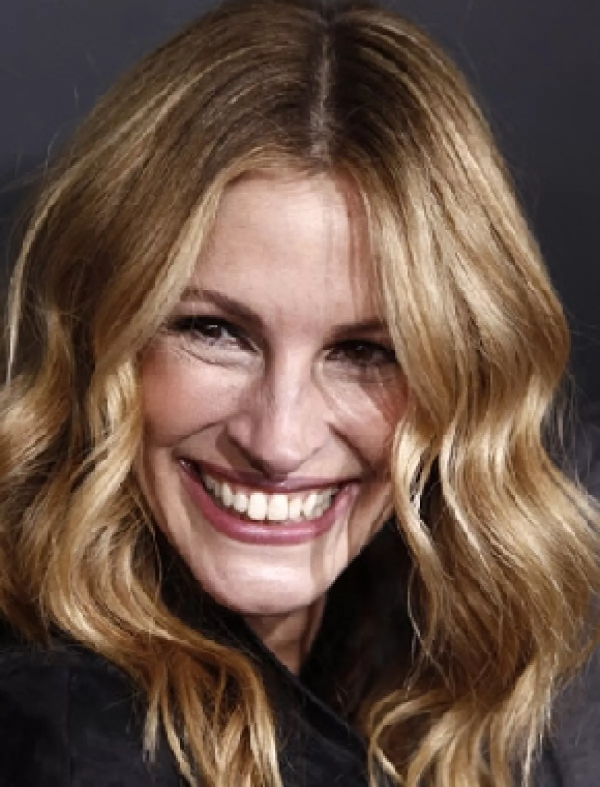 Su sonrisa sincera y sus rizos han encantado a propios y extraños.