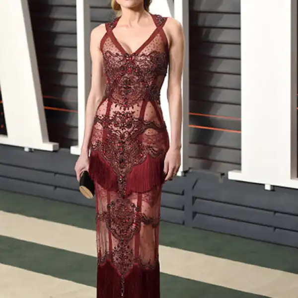 Olivia Palermo en el Front Row de Carolina Herrera usando un conjunto de la marca.
