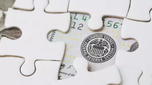 FED strategy of interest rate hike, United States of America financial or economics concept, jigsaw or puzzle reveals US Federal Reserve emblem on US dollar bill