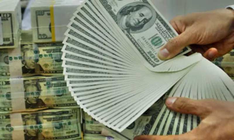 Del monto total de las fusiones y adquisiciones registradas en México el año pasado, la mitad correspondió a la compra-venta de Grupo Modelo. (Foto: AP)