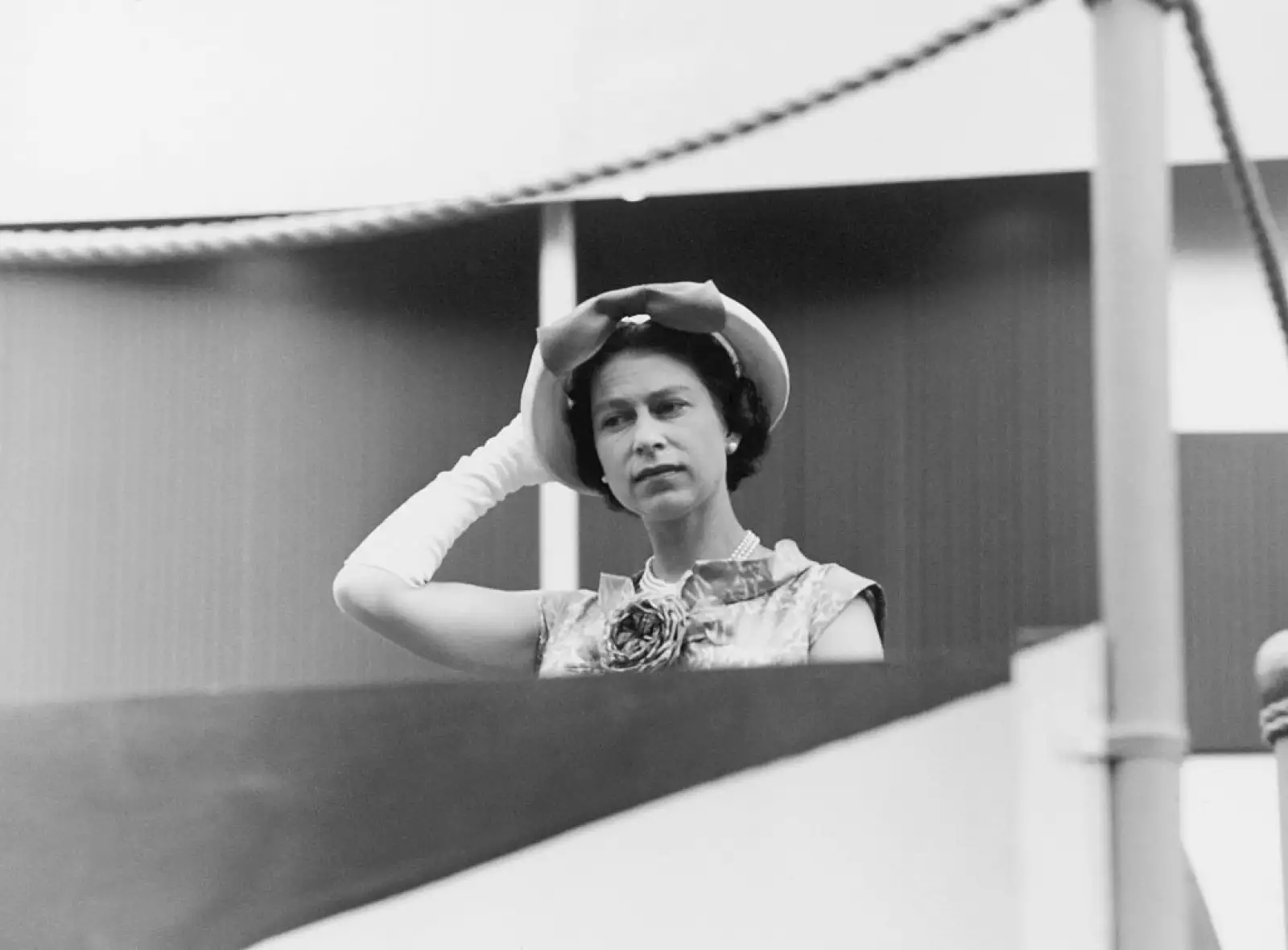 Her Majesty Queen Elizabeth II holding her hat during the Royal tour of Canada June 1959.