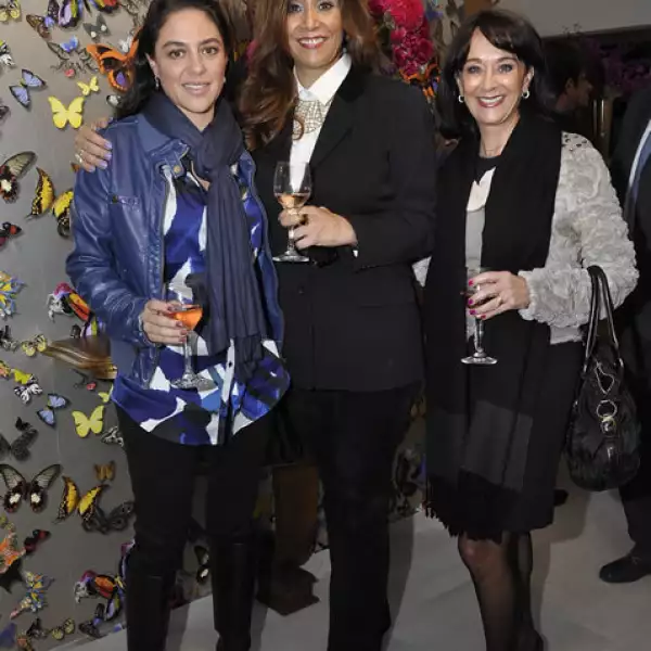 Andrea y Linda Caram con Caridad Martínez