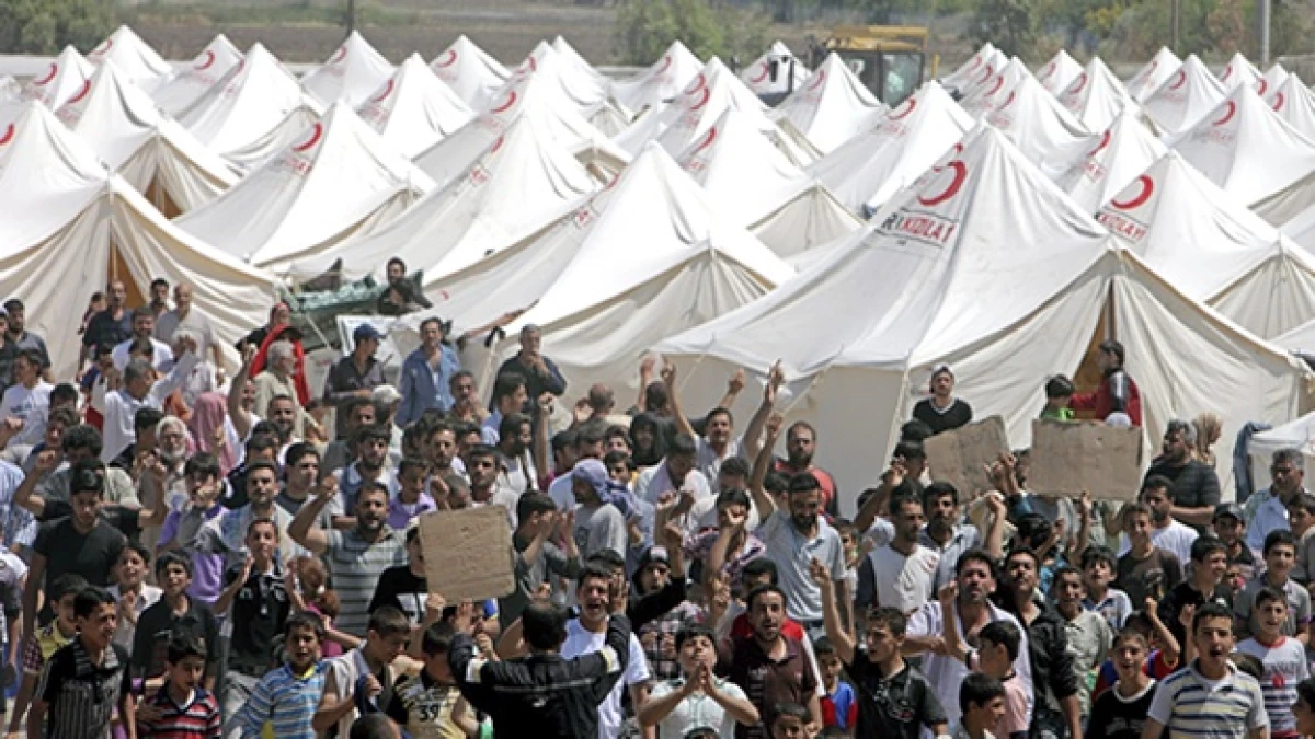 refugiados sirios gritan consignas contra presidente