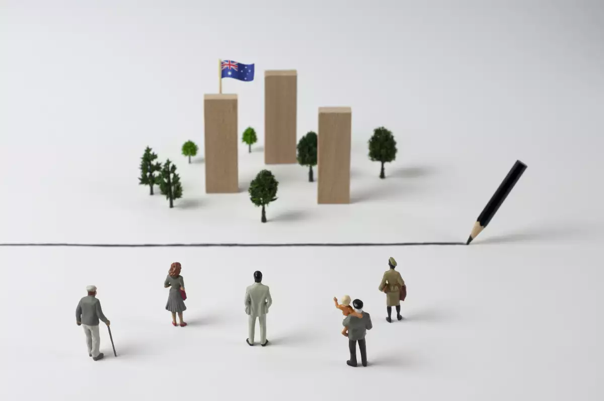 maqueta de personas frente a bandera de australia 