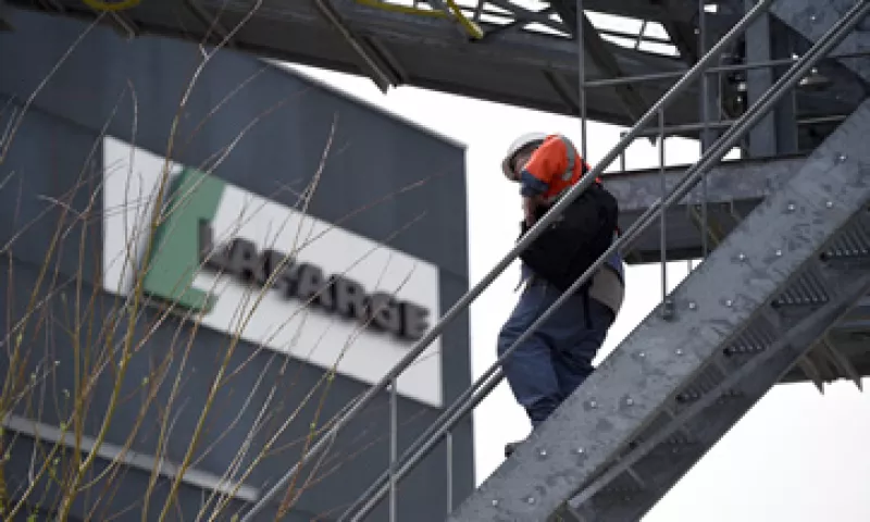 El millonario ha calificado como pocos satisfactorios los términos de la fusión Holcim-Lafarge. (Foto: AFP )