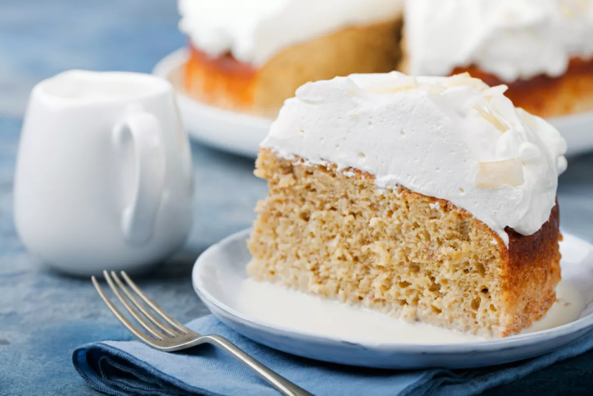 Three milk cake with coconut. Traditional dessert of Latin America.