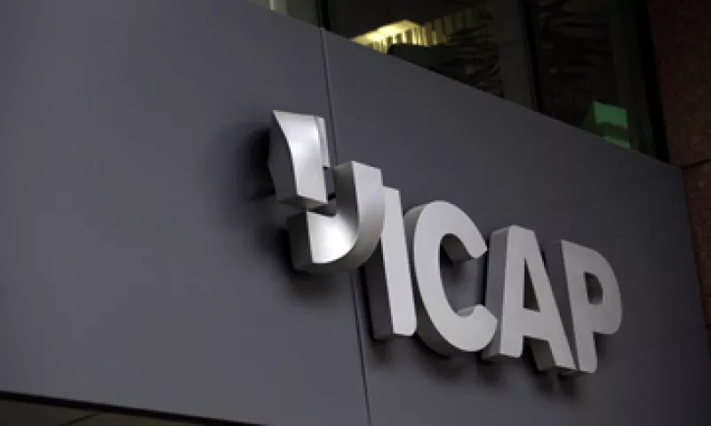 Las autoridades afirman que los corredores de esta agencia británica y de otras firmas ayudaban a los traders a amañar las tasas. (Foto: Getty Images)