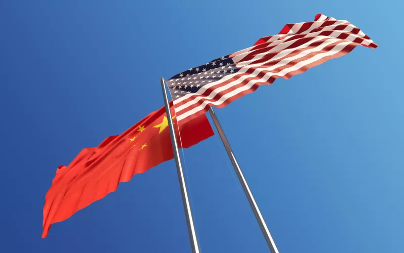 American and Chinese Flags Waving With Wind: Dispute Concept