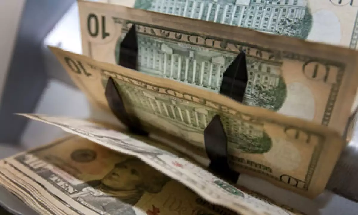 Banco Base estima que este viernes el dólar podría cotizar entre 12.58 y 12.67 pesos. (Foto: Getty Images)