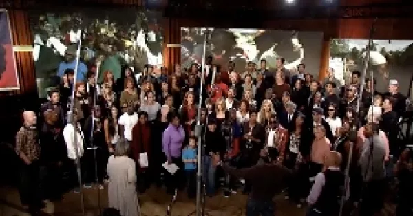 La nueva versión de la canción, a beneficio de las víctimas del terremoto en Haití, fue estrenada durante la transmisión de la ceremonia inaugural de los Juegos Olímpicos de Invierno.