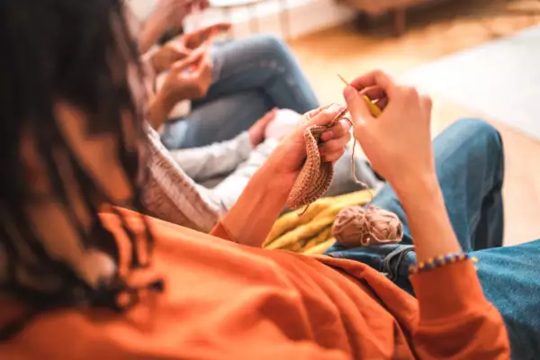 Quality Family Time: Knitting and Crocheting Joy in Retro Living Room