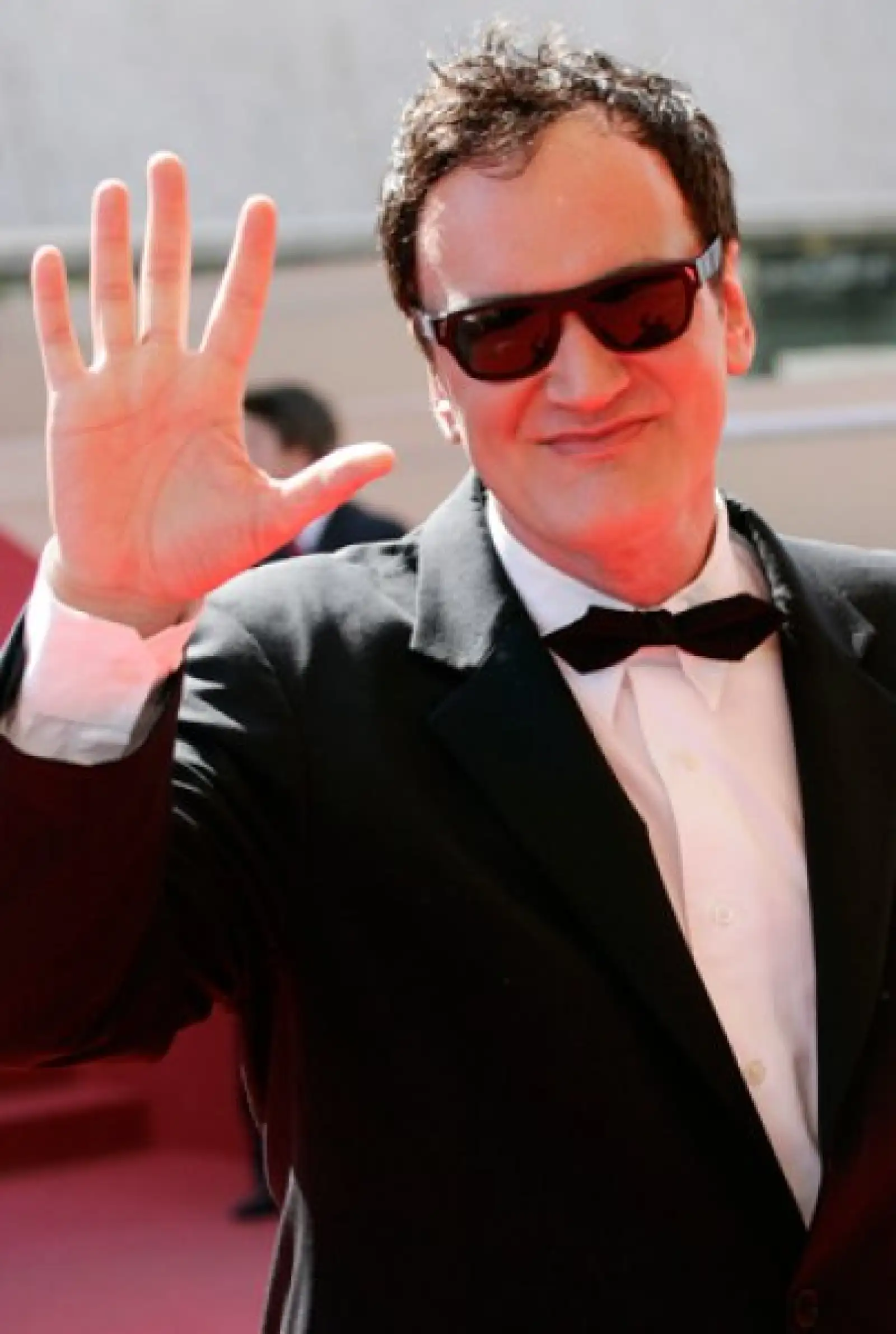 El reconocido director Quentin Tarantino desfila en la alfombrta roja previa a la presentación d "Kinatay".