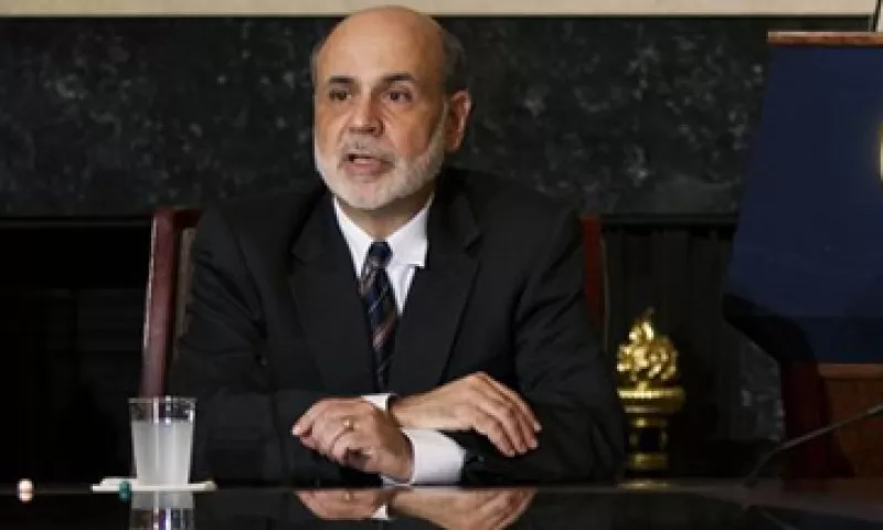 La entidad comandada por Ben Bernanke decidió mantener su tasa de interés entre 0.0% y 0.25%.(Foto: AP)