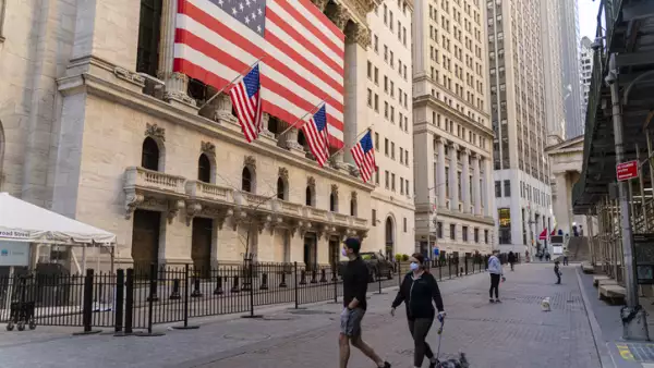 Economic recession is coming. ‘Fearless Girl’ Statue in front of the Stock Exchange from the Wall Street deserted because of the COVID-19 pandemic.