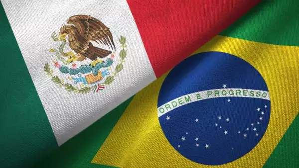 Brazil and Mexico two flags together textile cloth fabric texture