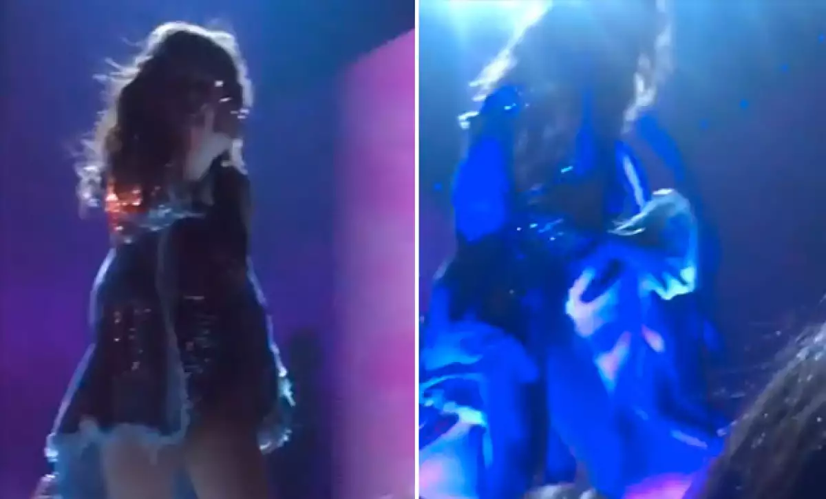 Selena pidió a su fan que le entregara el letrero para después tirarlo.