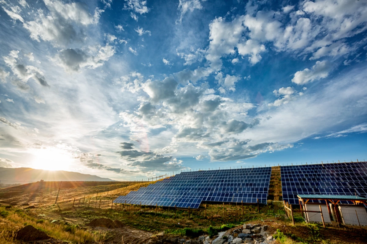 Field Of Solar Panels In A Rural Setting