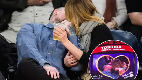 En su primera aparición pública tras su boda, la actriz y Benji Madden fueron sorprendidos por la cámara romántica, durante un partido de los Lakers, de la que no pudieron escapar.