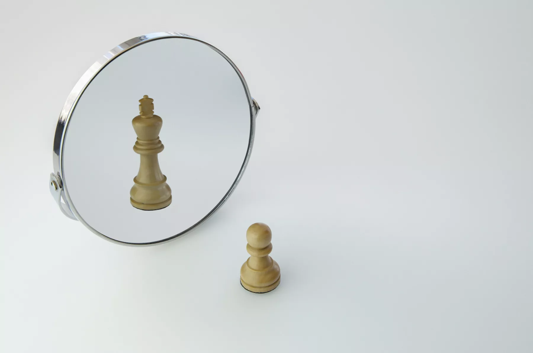 Chess Pawn imagining itself as a King,  pawn in a Mirror being a king