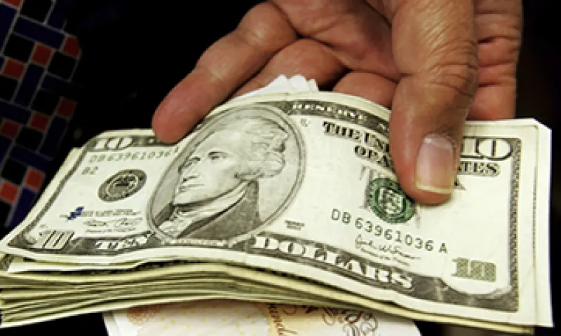 Banco Base estima que el tipo de cambio se ubicará en un rango de entre 12.96 y 13.00 pesos por dólar. (Foto: Getty Images)