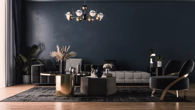 Modern interior design of upholstered furniture against the background of a classic wall.