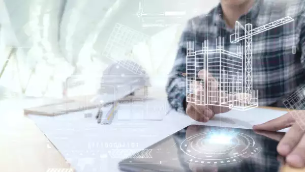 Engineer or Architect looking and touching interface with building design reality virtual technology on computer tablet at modern office on site . Building automation digital wireless control concept