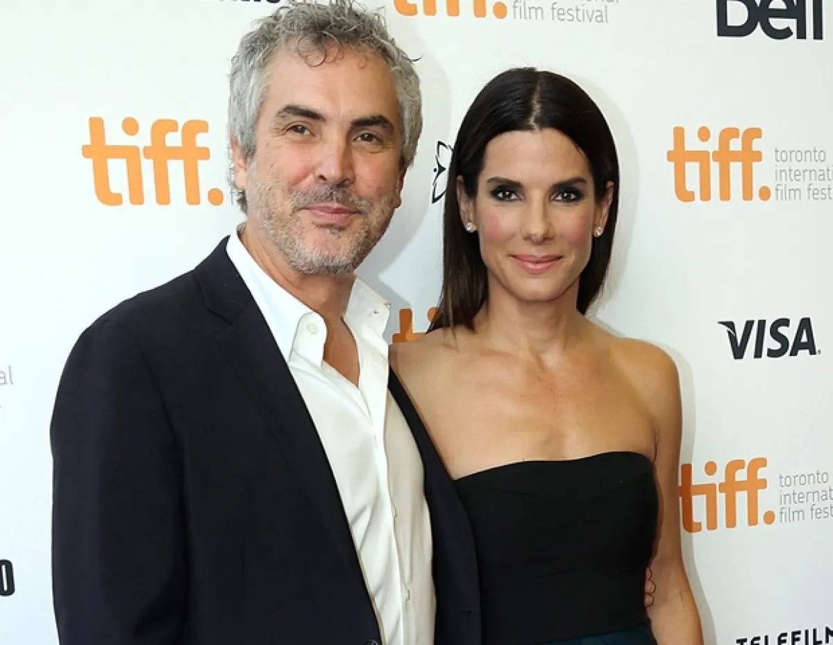Alfonso Cuarón junto con su musa Sandra Bullock