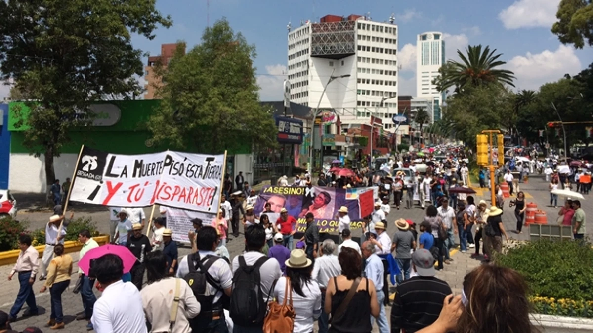 El contingente que salió a las calles de Puebla para exigir la renuncia del gobernador panista Rafael Moreno Valle
