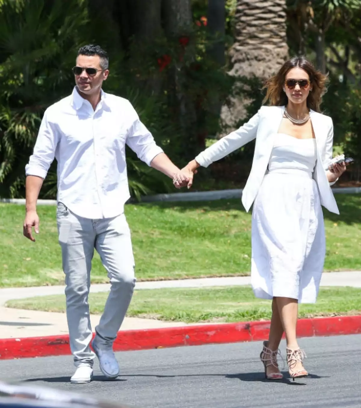 Jessica y Cash a su llegada a la boda de este viernes.