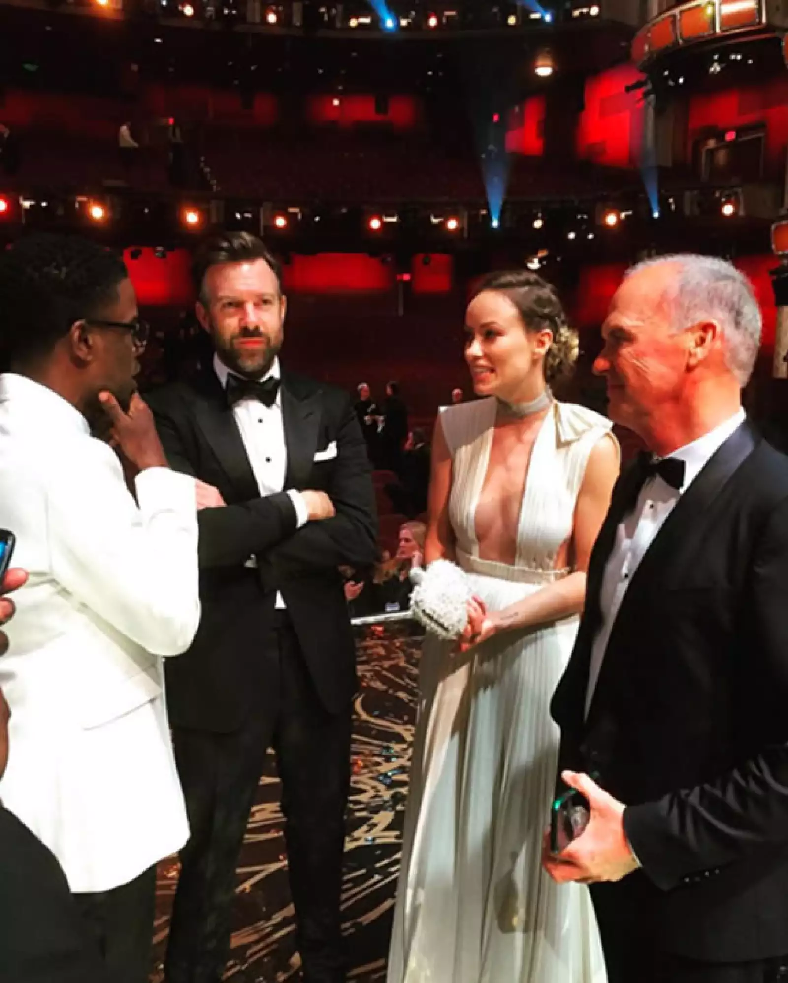 Chris Rock, Olivia Wilde, Michael Keaton y Jason Sudeikis durante los Oscar.